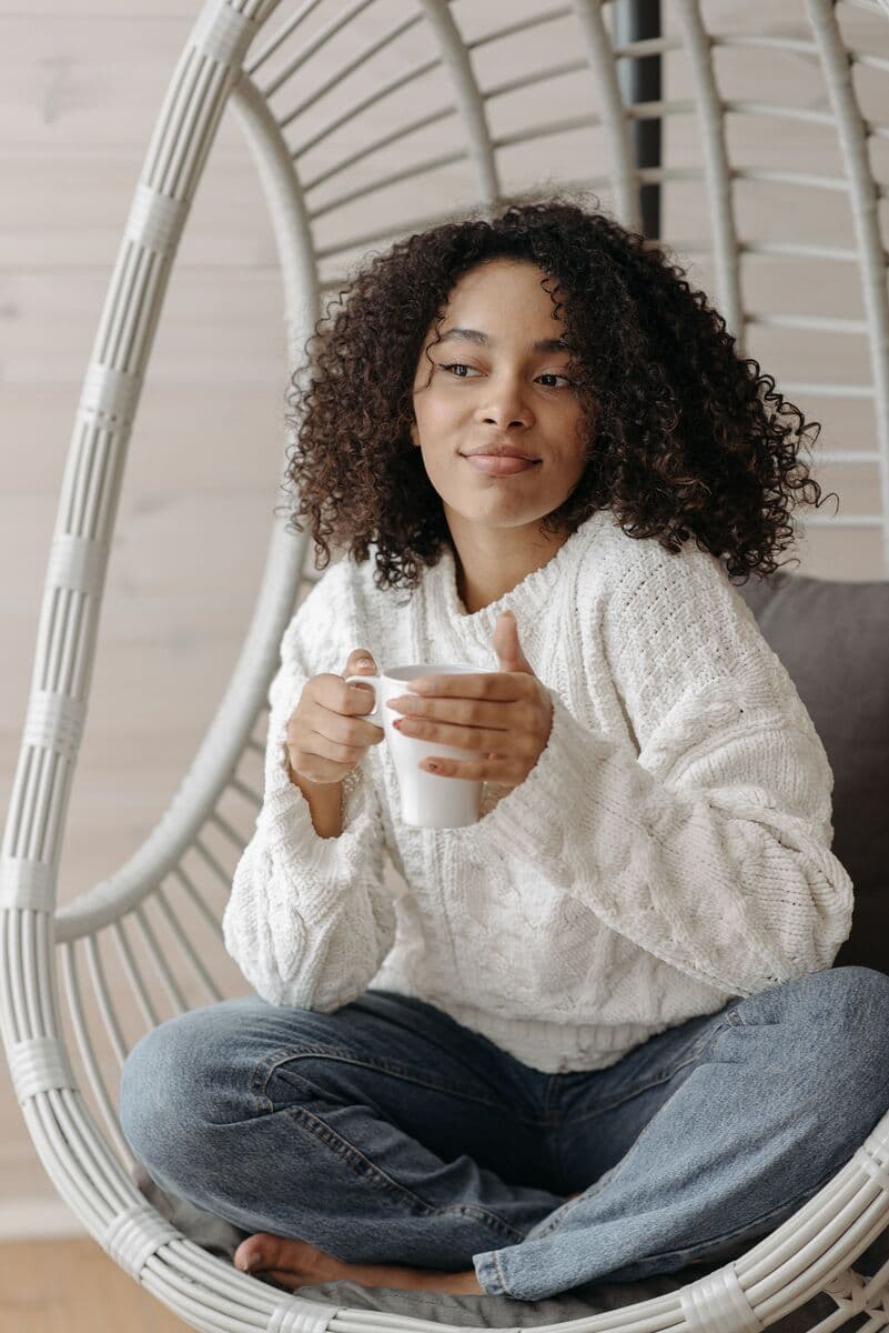 Homeowner relaxing at home with a coffee